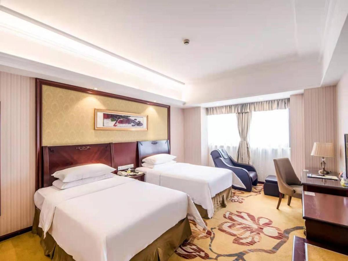 Vienna International Hotel Shanghai Pudong Xiupu Road Exterior photo